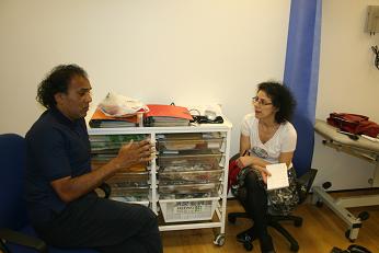 Jeff explains how the service works to Maria 